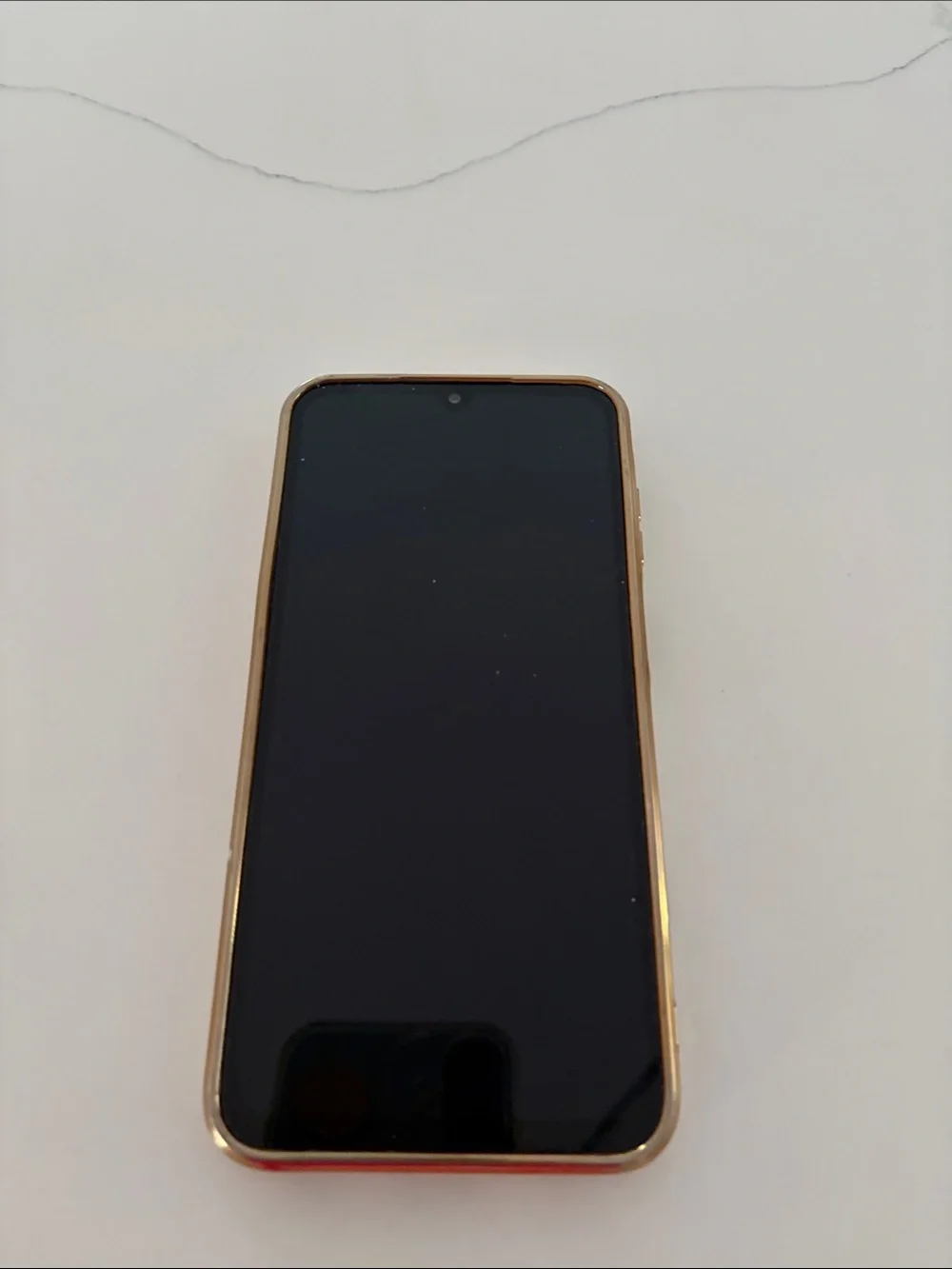 Gabb phone 4. Like new. Stylish Gold pink phone case included